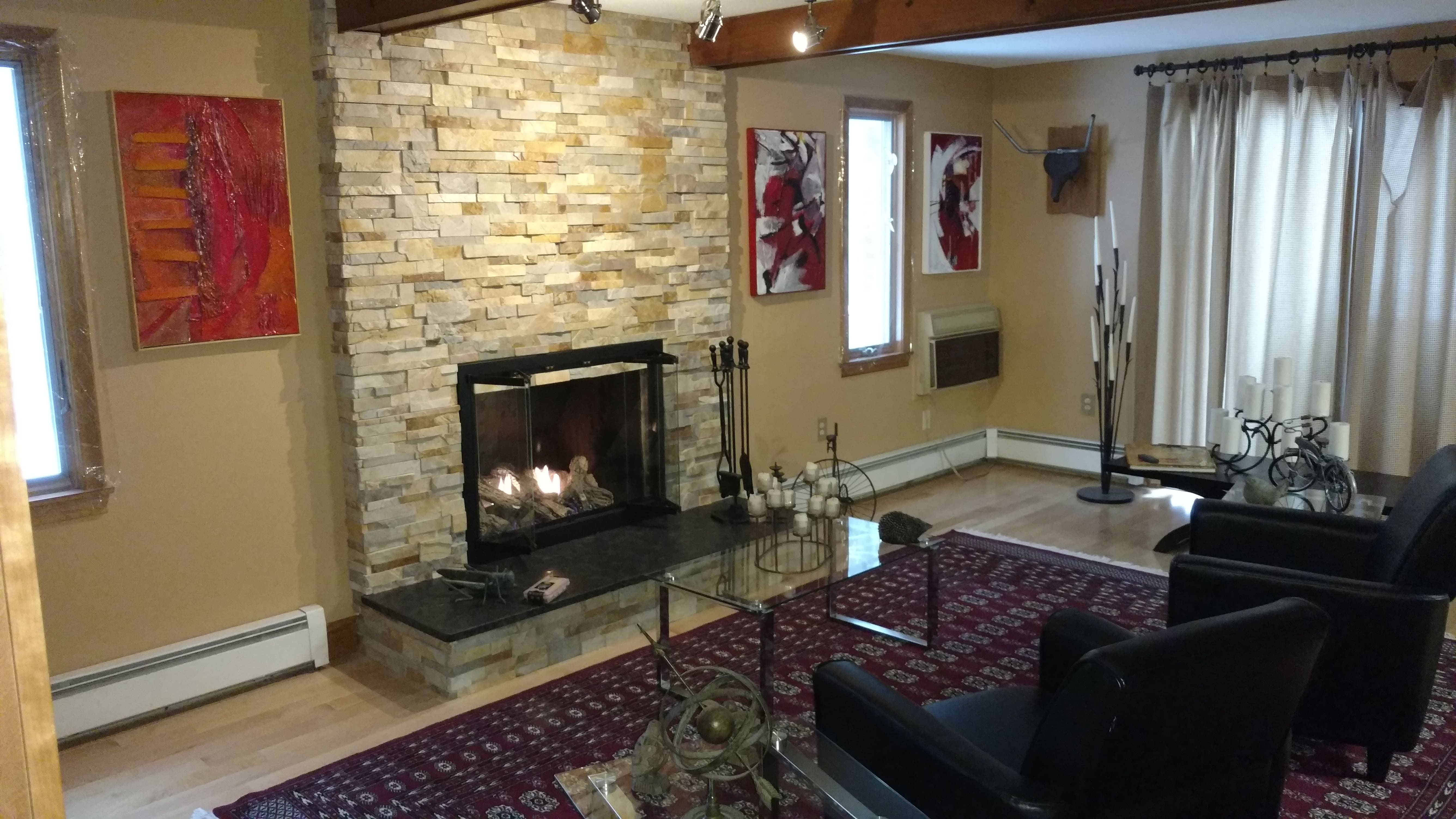 Norstone Aztec XL Stone Veneer Fireplace Remodel Project with new granite hearth stone